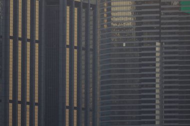 15 Ocak 2024 Günbatımlı Hong Kong şehri mimarisi.