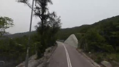 HONG KONG - 29 Mart 2024; Shek O 'nun gündüz vakti zaman aşımı yolu 