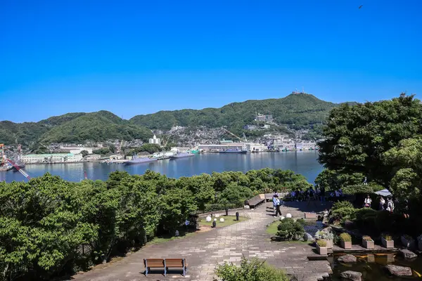 stock image the pond and garden before the Former Mitsubishi No.2 Dock House May 14 2024