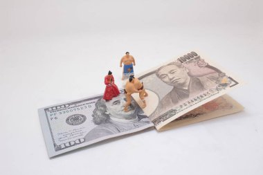 sumo güreşi bankada Yen ve Amerikan doları.