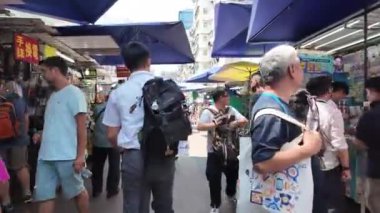 Hong Kong - August 27, 2024: Crowd at Apliu Street, HK