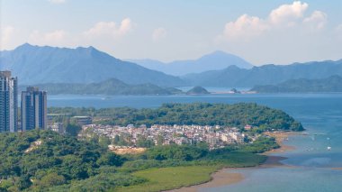 A Serene Village by the Coast in Hong Kong Shap Sze Heung clipart