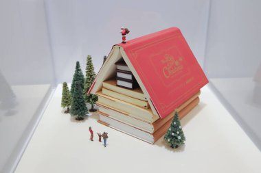 Creative Christmas Book House With Miniature Scene Nov 22 2024 clipart