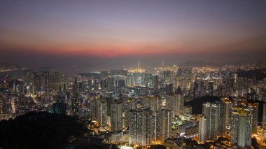 City Skyline at Dusk With Illuminated Buildings Dec 19 2024 clipart