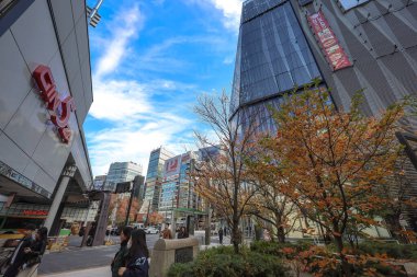 Dec 5 2024 scenery showcasing a bustling city intersection with contemporary architecture clipart