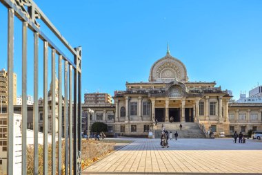 Dec 7 2024 historic architectural building with a central dome, visitors exploring clipart