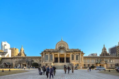 Dec 7 2024 historic architectural building with a central dome, visitors exploring clipart