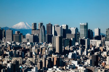9 Aralık 2024 Tokyo 'nun hareketli şehir manzarası ve görkemli Mt. Fuji