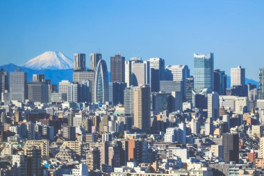 9 Aralık 2024 Tokyo 'nun hareketli şehir manzarası ve görkemli Mt. Fuji