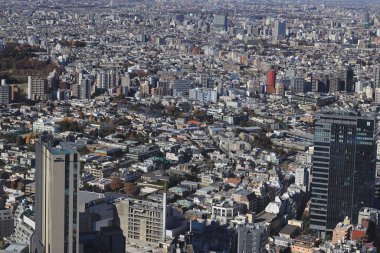 10 Aralık 2024 şehir manzaralı modern gökdelenli binalar.