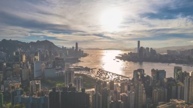 Kowloon Hong Kong 'da Günbatımı Skyline Liman Manzarası