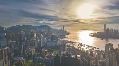 Kowloon Hong Kong 'da Günbatımı Skyline Liman Manzarası