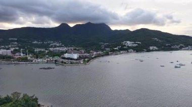 5 Temmuz 2025 'te Sunset' te Sai Kung Rıhtımı boyunca Huzurlu Gezinti