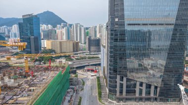 Vinçlerin yer aldığı hareketli İnşaat Alanı, Hong Kong 'daki İskele Çerçeveleri