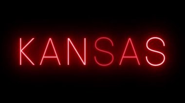 Kırmızı yanıp sönen ve yanıp sönen Kansas tabelası.