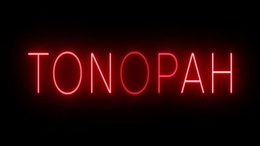 Tonopah için yanıp sönen kırmızı neon ışığı