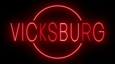 Vicksburg şehri için yanıp sönen kırmızı neon ışığı.