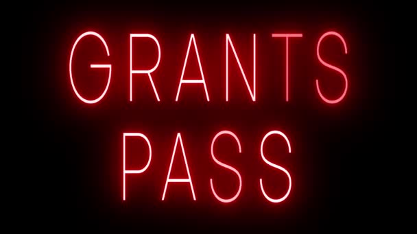 在Grants Pass黑色背景下闪烁着红色复古风格的霓虹灯标志 — 图库视频影像