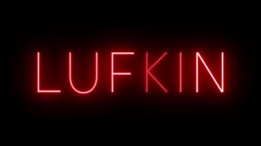 LUFKIN için siyah bir arkaplan üzerinde parlayan yanıp sönen kırmızı retro biçim neon işareti