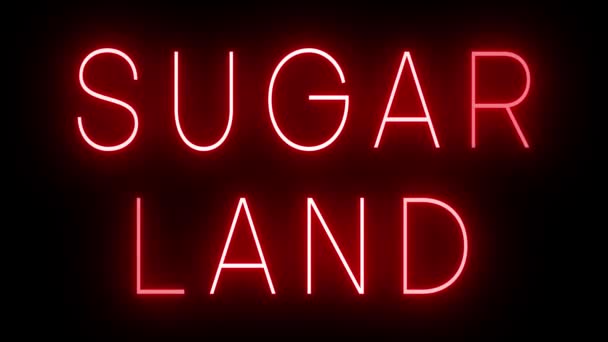 在Sugar土地的黑色背景下闪烁着红色复古风格的霓虹灯标志 — 图库视频影像