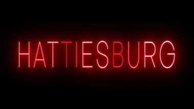HATTIESBURG için siyah bir arkaplan üzerinde parlayan yanıp sönen kırmızı retro tarzı neon tabela