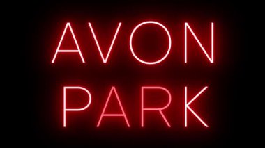 AVON PARK için siyah bir arkaplan üzerinde parlayan yanıp sönen kırmızı retro tarzı neon tabela