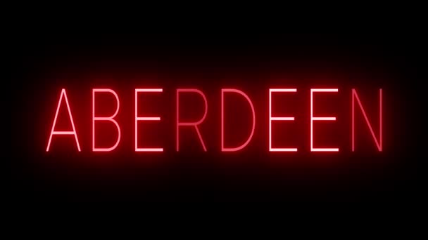 Aberdeenの黒い背景に対して輝く赤いレトロスタイルのネオンサイン — ストック動画