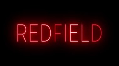 REDFIELD için siyah bir arkaplan üzerinde parlayan yanıp sönen kırmızı retro tarzı neon tabela