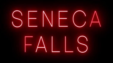 SENECA FALLS için siyah bir arkaplan üzerinde parlayan yanıp sönen kırmızı retro tarzı neon işareti