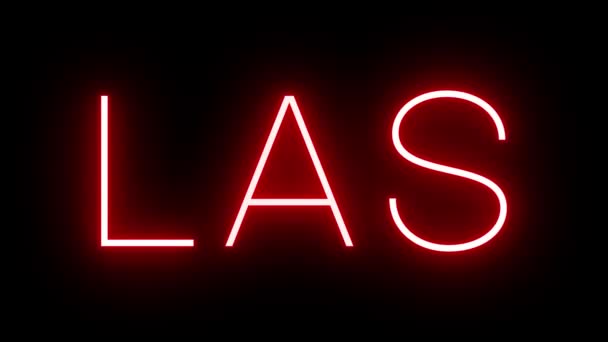 ラスベガス空港の3文字の識別子で輝き 点滅する赤いレトロネオンサイン — ストック動画