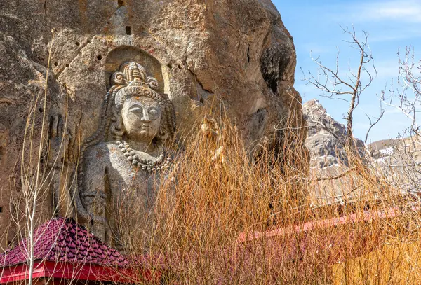 stock image Landmark carved stone Buddha at the Mulbekh Gompa near Kargil in northern India