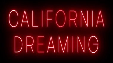 Parıldayan kırmızı retro tarzı neon ışığı siyah bir arkaplan üzerinde parlıyor CALIFORNIA DREAMING