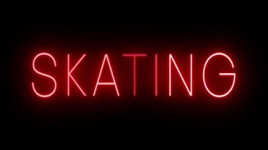 Parıldayan kırmızı retro tarzı neon ışığı siyah arkaplan patinajına karşı parlıyor