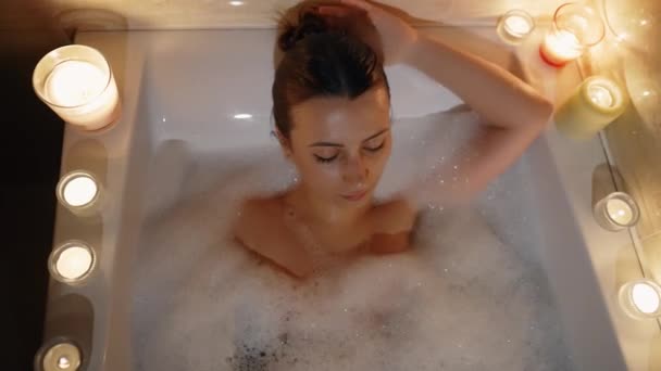 Young Woman Take Bubble Bath Candles — Vídeo de Stock