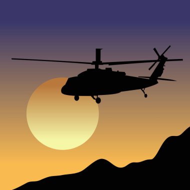 Gün batımı geçmişi olan askeri helikopter