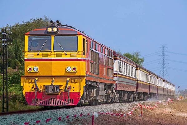 stock image Passenger train by diesel locomotive on the railway.