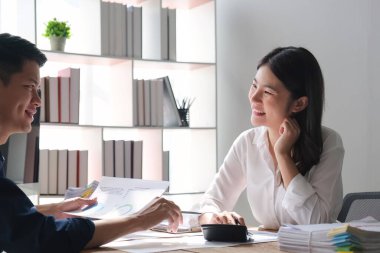 Bookkeepers team or financial inspectors making report, calculating and checking balance. Tax service financial document. Audit or meeting concept.