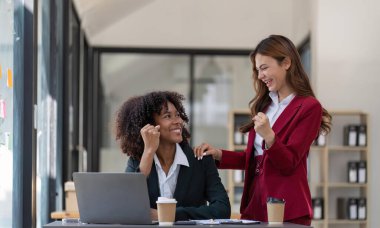 Happy smiling businessman feel happy work complete Teamwork success at work in the office concept.