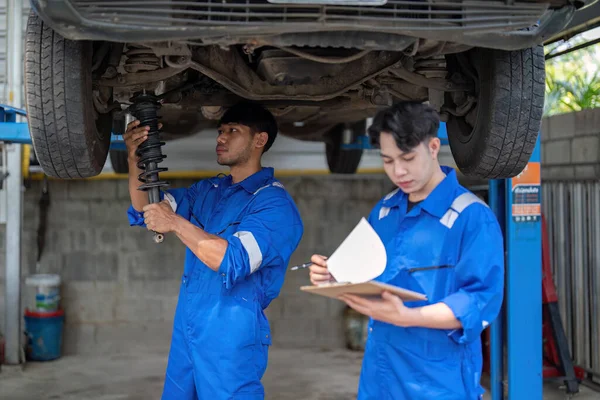 Mechanic Man Shows Report Asian Coworker Garage Man Mechanic His — Stock Photo, Image