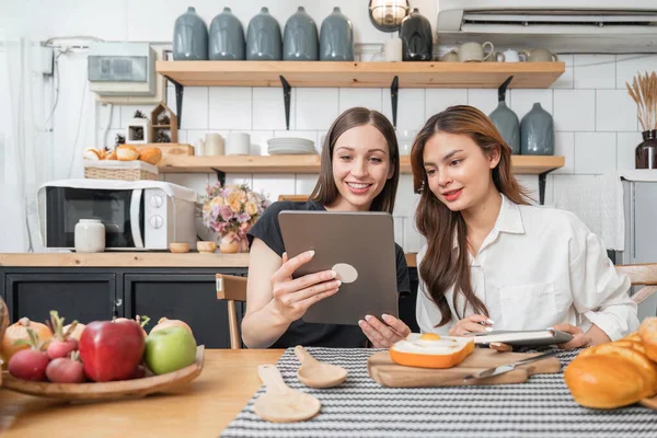 stock image girl chef helping each other to cook healthy food of salad from tasty organic vegetable by learning recipe 