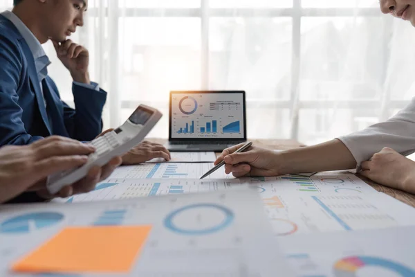 Business team collaboration discussing working analyzing with financial data and marketing growth report graph in team, presentation and brainstorming to strategy planning making profit of company.