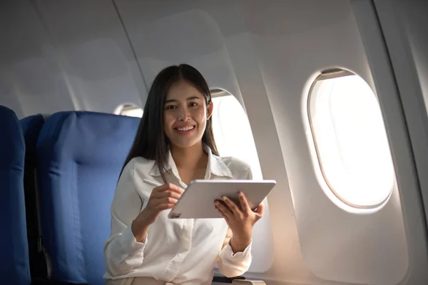 Successful Beautiful Young Asian Business Woman Sits Airplane Cabin Plane — Stock Photo, Image