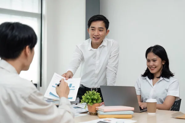 businesspeople at meeting collaboration and teamwork of work meeting new startup project idea presentation analyze plan marketing and investment in an office.