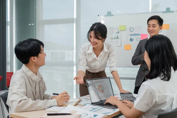 businesspeople at meeting collaboration and teamwork of work meeting new startup project idea presentation analyze plan marketing and investment in an office.