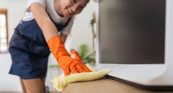 Asian young housekeeping or maid cleaning at home, Cleaning home concept.