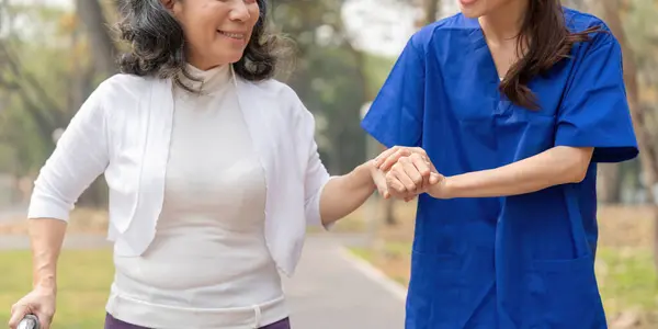 Nurse Senior Elderly Care Support Walking Stick Park Medical Caregiver — Stock Photo, Image