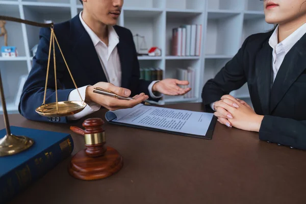 Lawyer hand concept justice with judge gavel, Businessman in suit or Hiring lawyers in the digital system. legal law, prosecution, legal adviser, lawsuit, detective, investigation legal consultant.