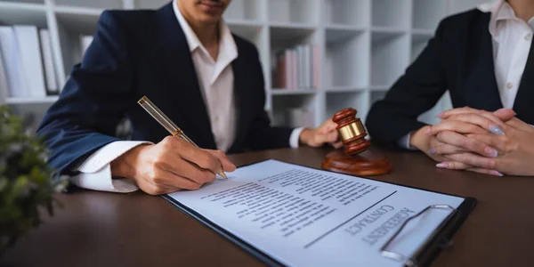Lawyer hand concept justice with judge gavel, Businessman in suit or Hiring lawyers in the digital system. legal law, prosecution, legal adviser, lawsuit, detective, investigation legal consultant.