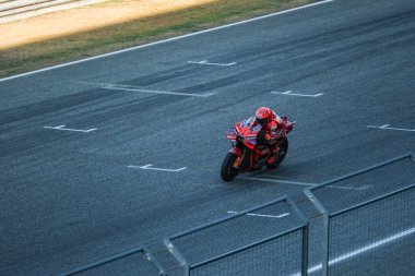 BURIRAM, THAILAND - FEBRUARY 12, 2025: Marc Marquez of Spain and Ducati Lenovo Team MotoGP during new bike testing at Chang International Circuit.. clipart