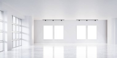 Minimalist bir ortamda sanat eserlerini ön plana çıkarmak için tasarlanmış boş çerçevelerin yer aldığı modern bir sergi alanı..